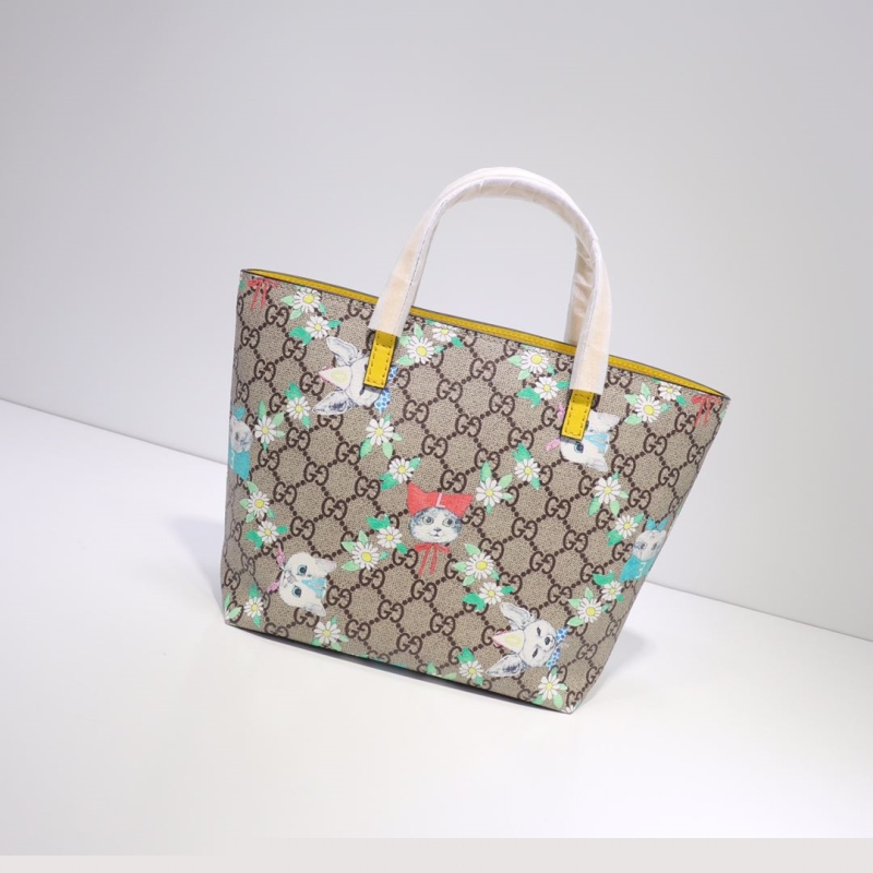 G*u*i shopping bags